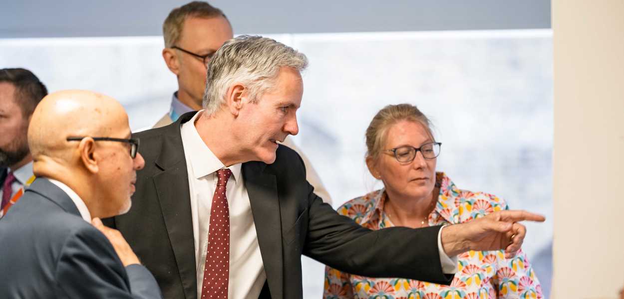 CEO Paul Hackett and Board Member Daisy Armstrong work together on an activity 