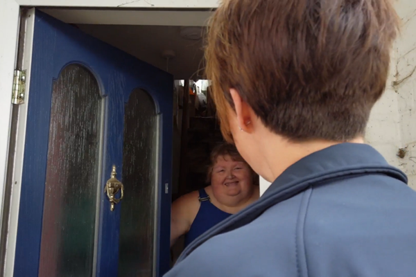 Resident opens door to Tenancy Sustainment Officer 