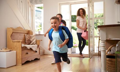 Boy running into house 