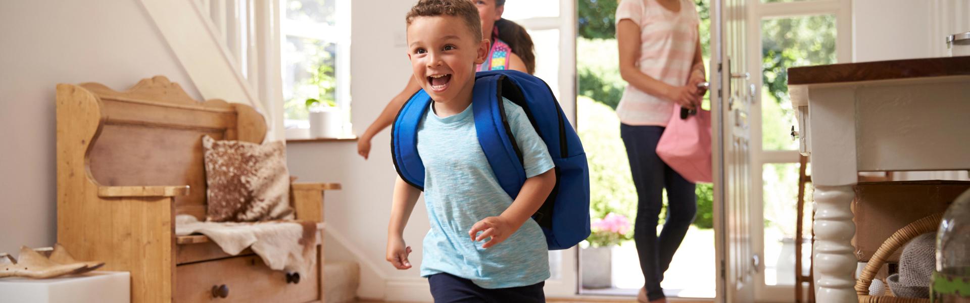 Boy running into house 